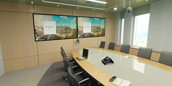 A boardroom set up with dual TVs for video conferencing